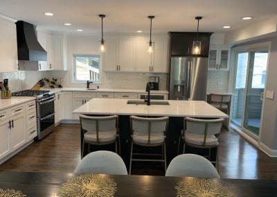 Spacious Chicago kitchen with white cabinets and modern appliances from Premium Cabinets Chicago, IL